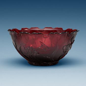 1480. An amethyst coloured and finely cut glass bowl with lotus flowers, late Qing dynasty (1644-1912).