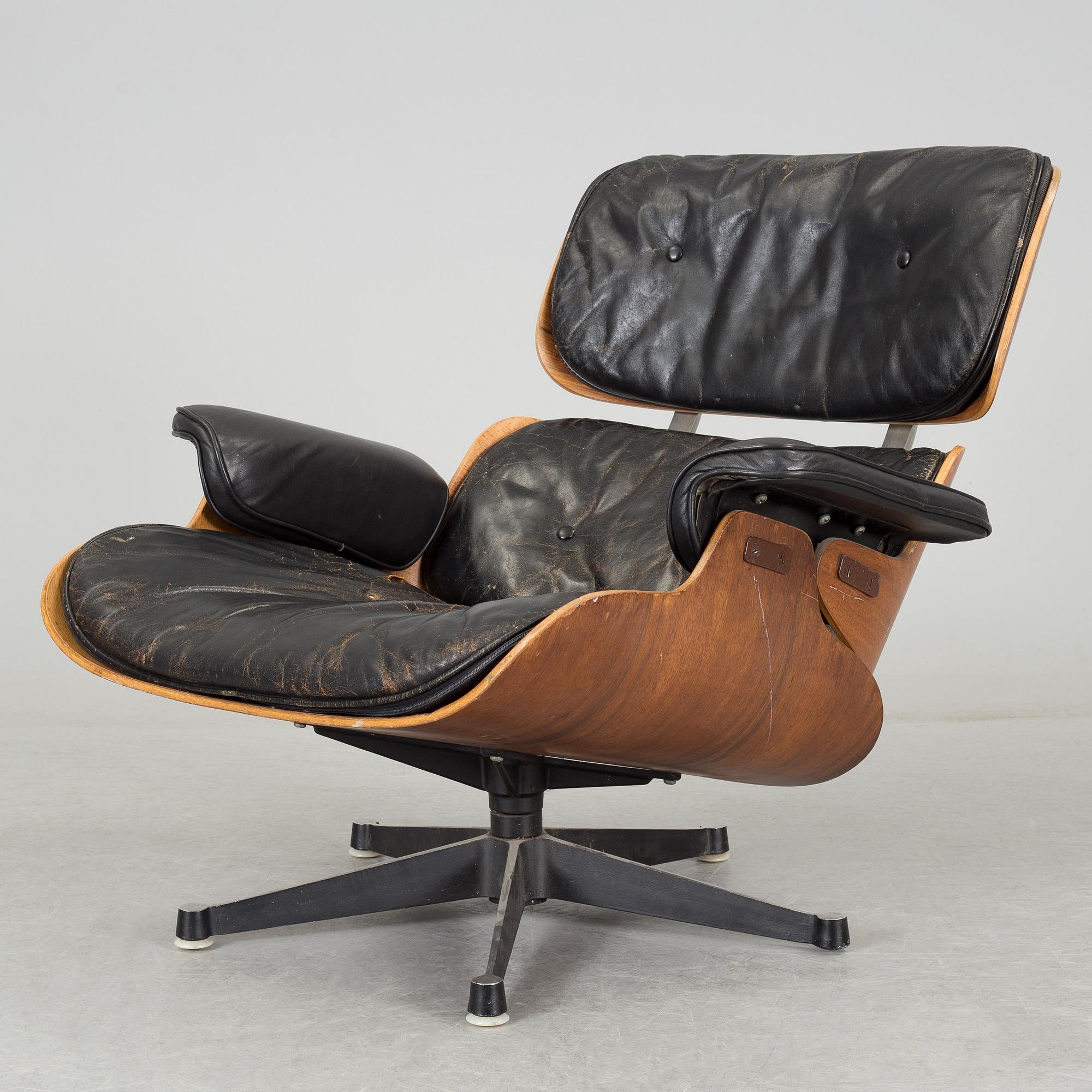 An easy chair and ottoman by Charles & Ray Eames, Herman Miller, USA, produced with licence by Hille, London.