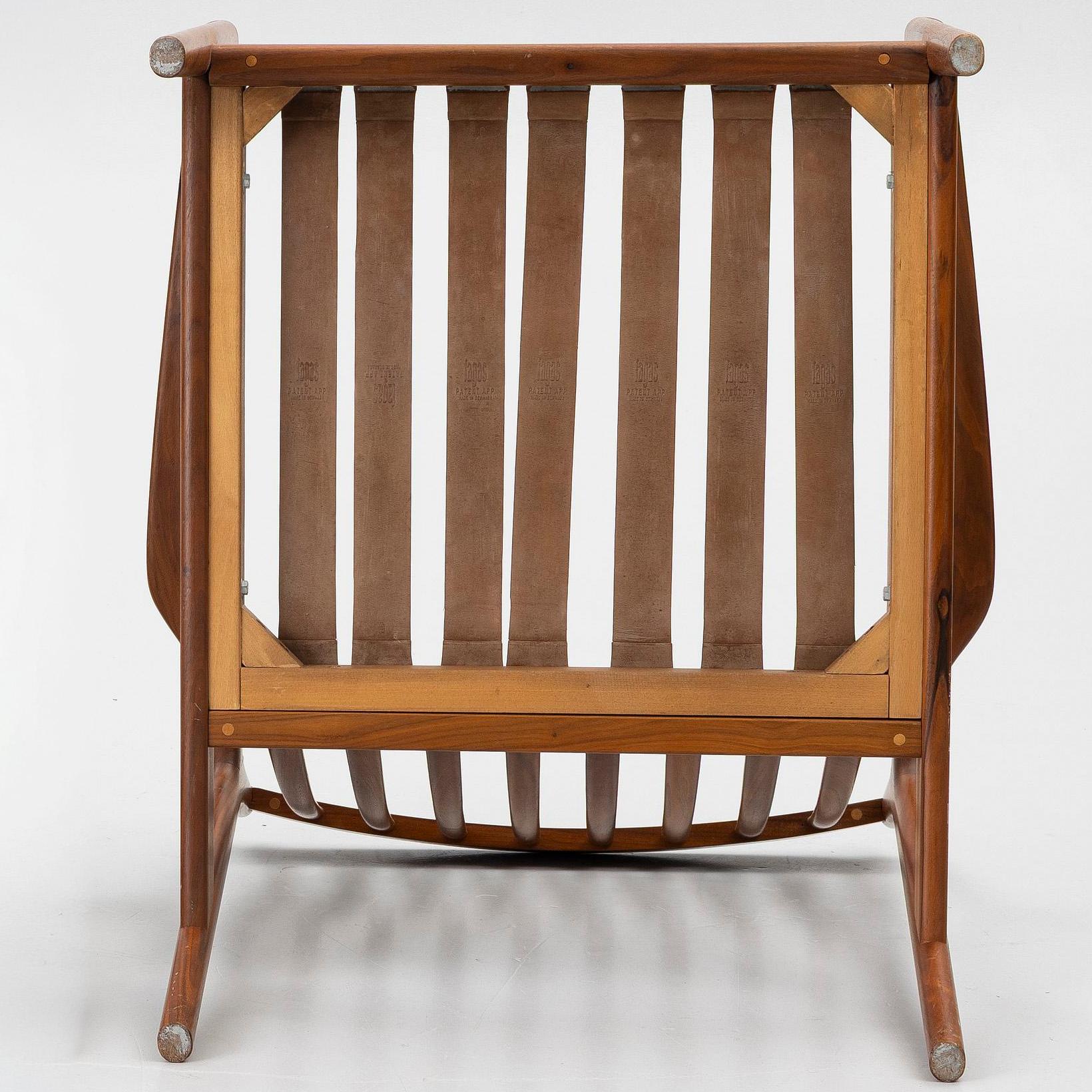 Folke Ohlsson, a pair of 'USA 75' armchairs, Dux, Sweden, 1960's.