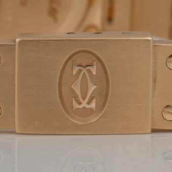 DAMUR, Cartier Santos, boett samt integrerad länk i 18K guld. Automat. Serienummer: 8090604461.