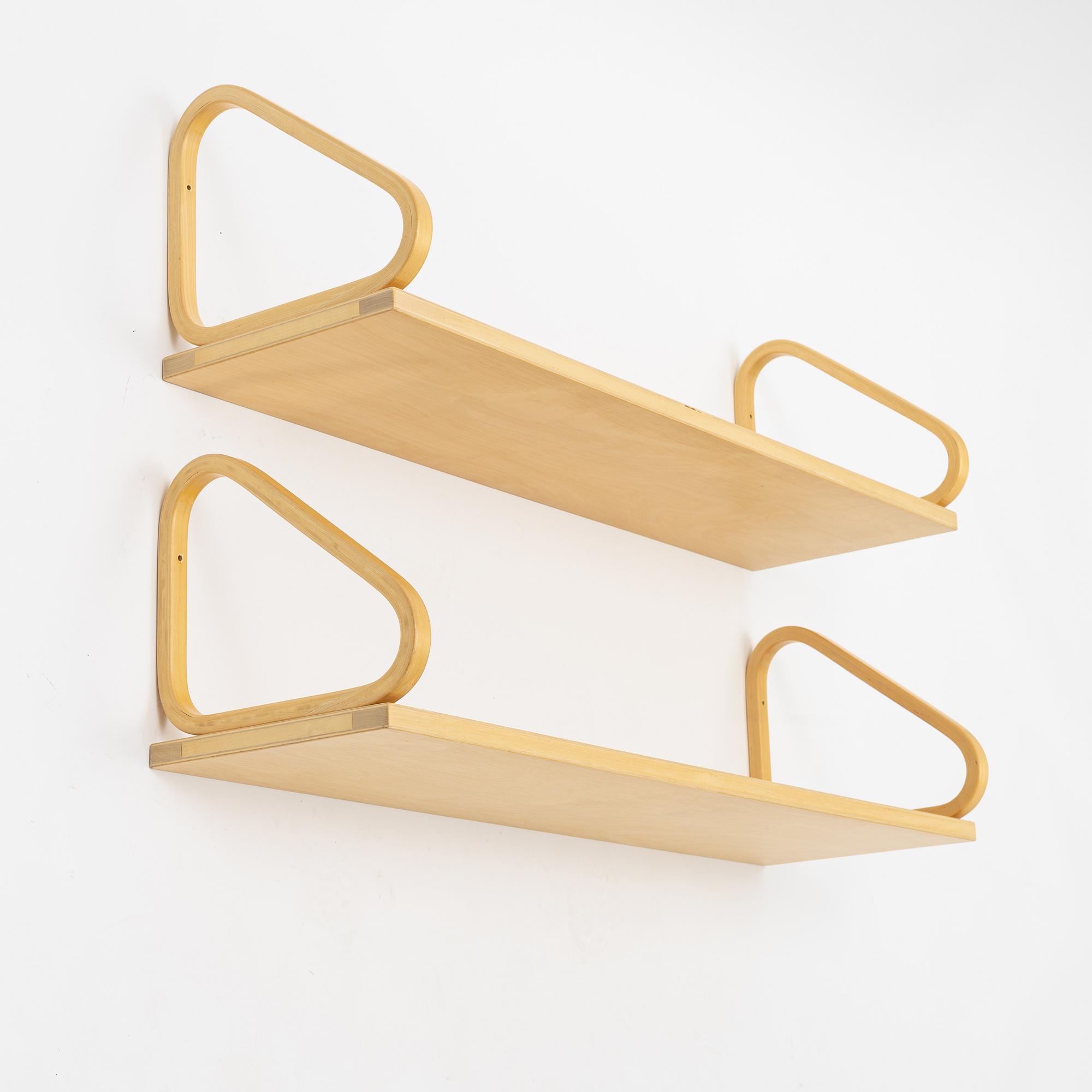 Alvar Aalto, a pair of shelves, Finland, 21st century.