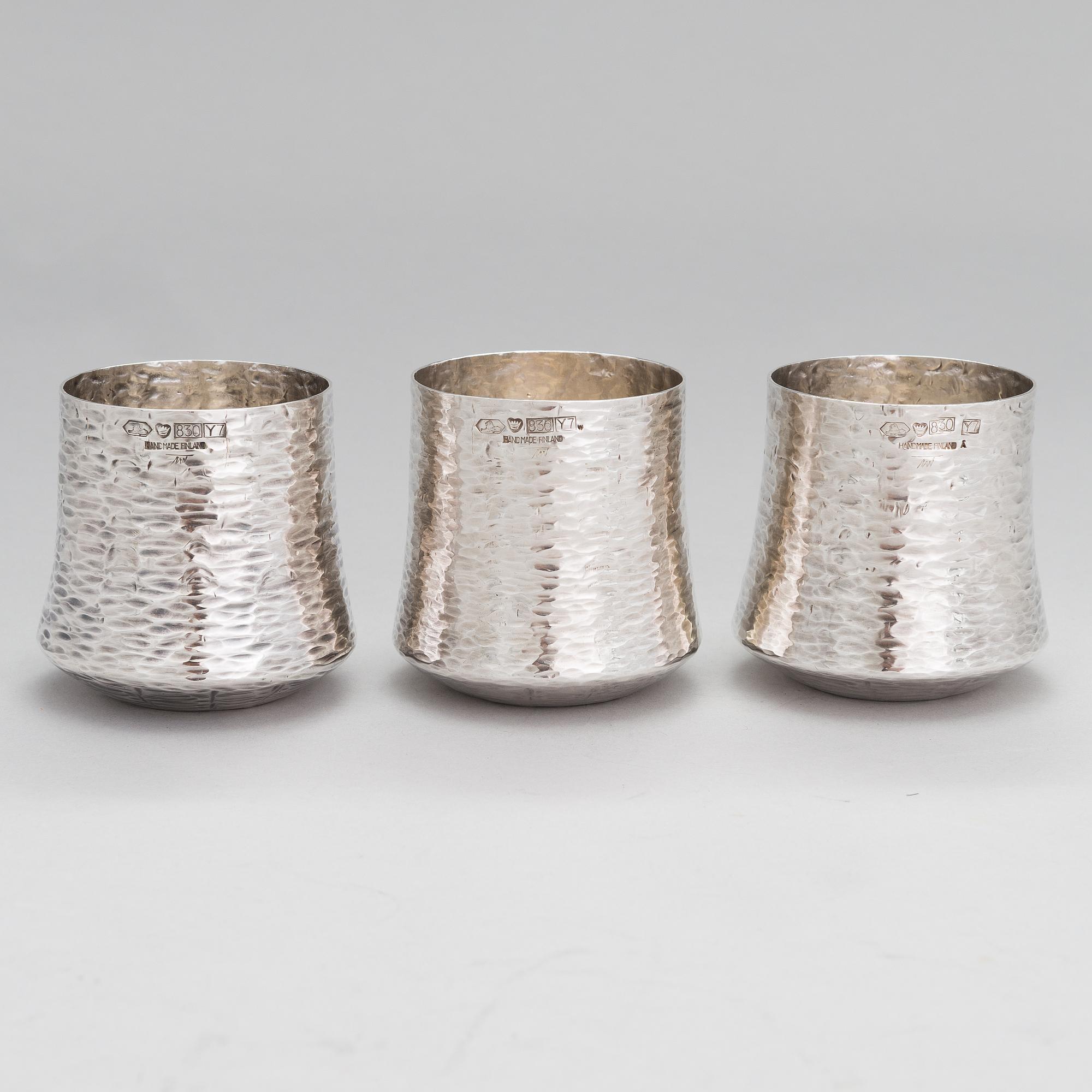 TAPIO WIRKKALA, A set of three silver beakers, marked TW, Kultakeskus, Hämeenlinna, Finland 1976.