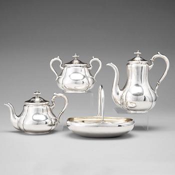 163. A Russian silver 3 piece tea-/coffee-set + 1, mark of Sazikov, Moscow 1862, basket marked Adam Markula, St Petersburg.