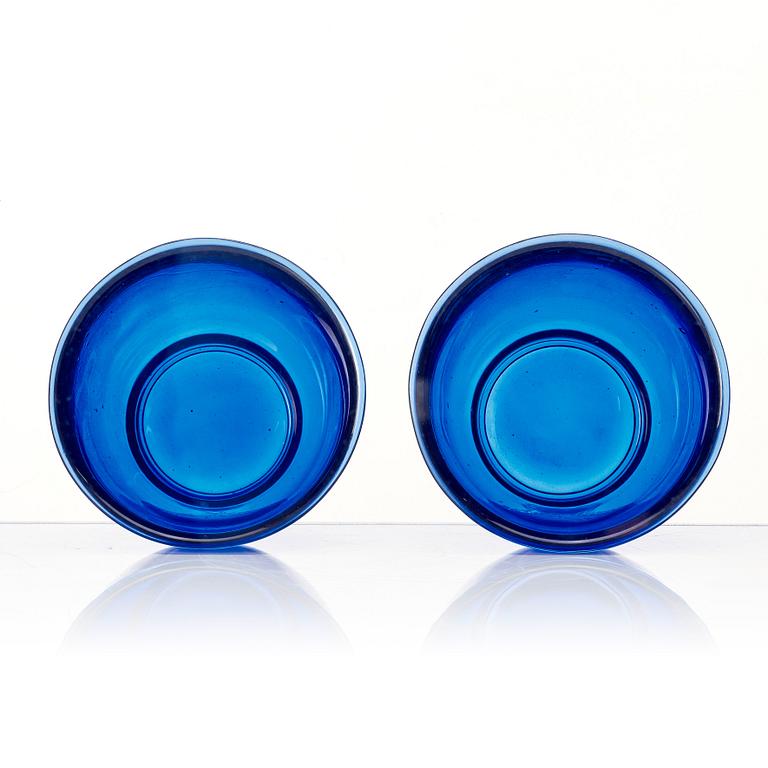 A pair of Chinese blue Beijing glass bowls, 20th century.