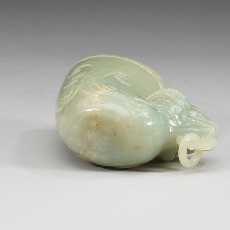 A Chinese carved nephrite rhyton beaker.