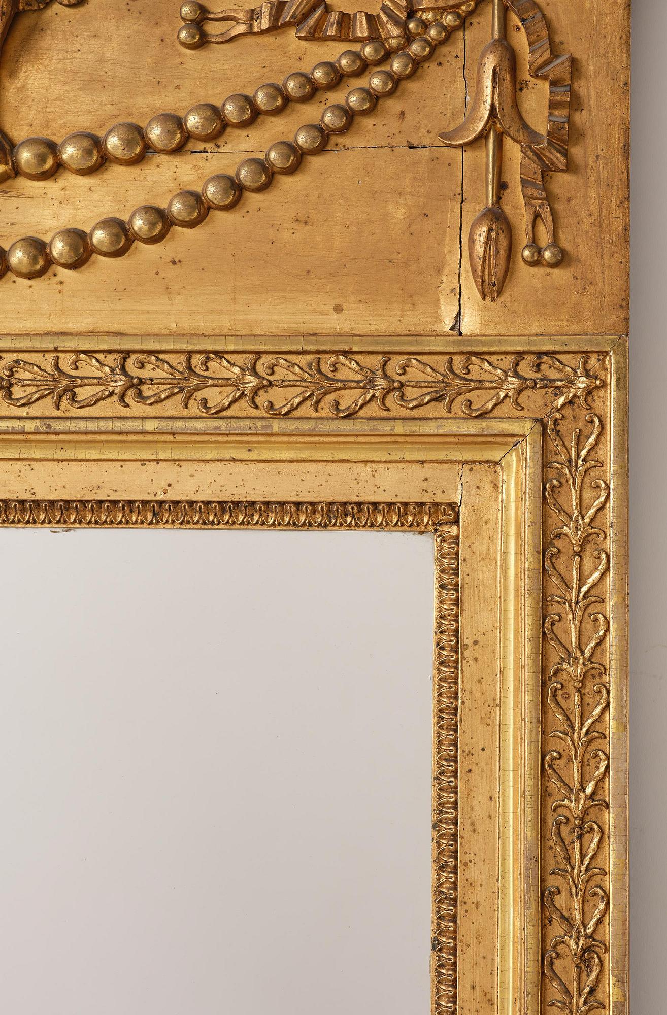 A late Gustavian giltwood mirror, Stockolm circa 1800.