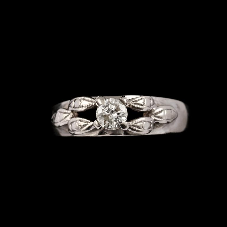 RING, 10k vitguld med briljantslipad diamant ca 0.25 ct. Vikt.