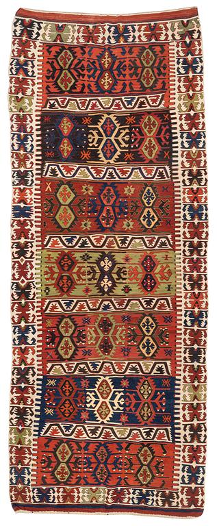 An antique southeast Anatolian kilim, c. 412 x 163 cm.