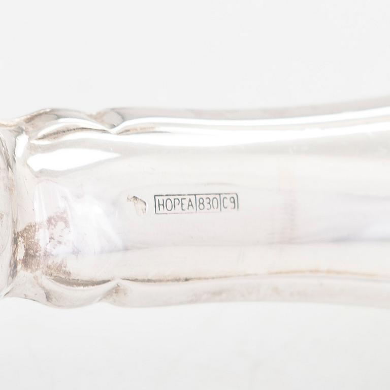 A 78-piece silver 'Chippendale' cutlery set, 1978-2007. Various Finnish manufacturers.