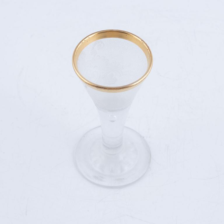 A presumably German engraved and gilt rococo glass, mid 18th century.