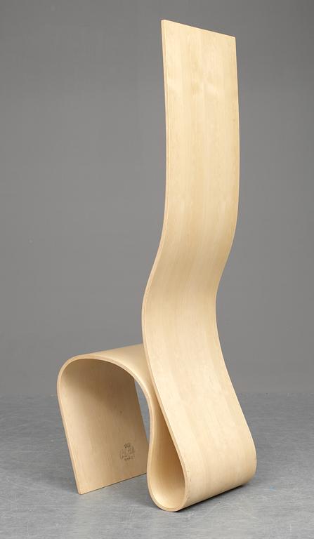 A Caroline Schlyter laminated birch chair "lilla h" by Forsnäs.