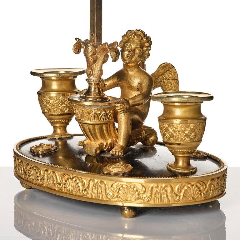 A Russian Empire ormolu and patinated bronse two-light lamp, early 19th century.