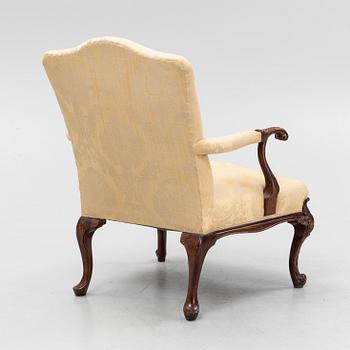 A carved mahogany George II armchair, 18th Century.