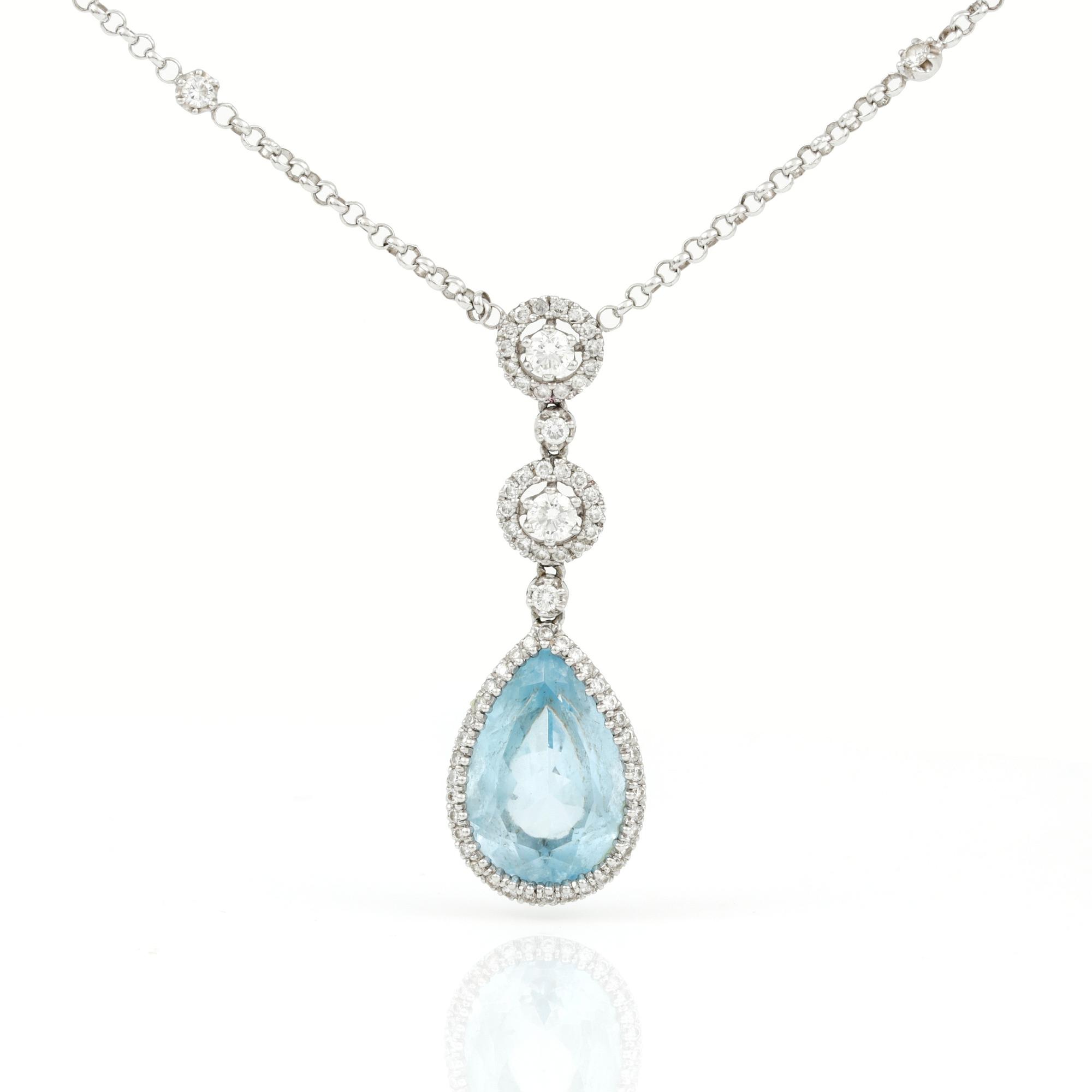 HÄNGSMYCKE, droppslipad topaz med briljantslipade diamanter, tot. ca 0.75 ct.