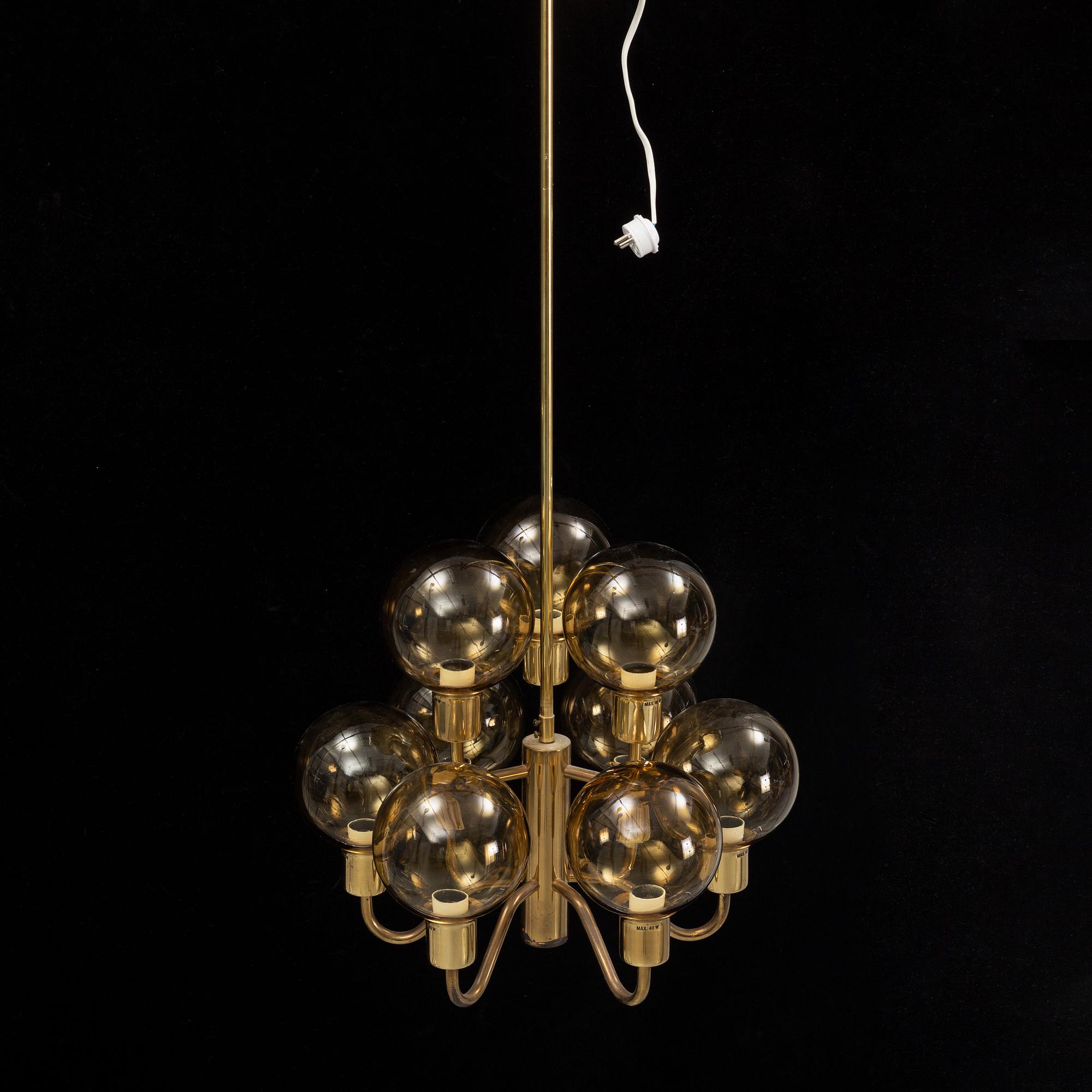 Hans-Agne Jakobsson, a late 20th century brass and glass ceiling lamp for nine lights, Markaryd, Sweden.