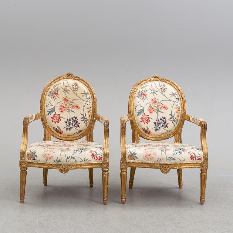 Two matched Gustavian late 18th century armchairs.