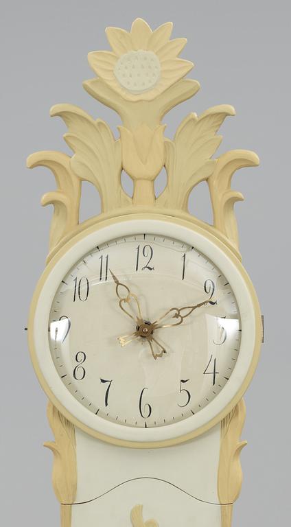 A Carl Malmsten painted and carved floor clock.
