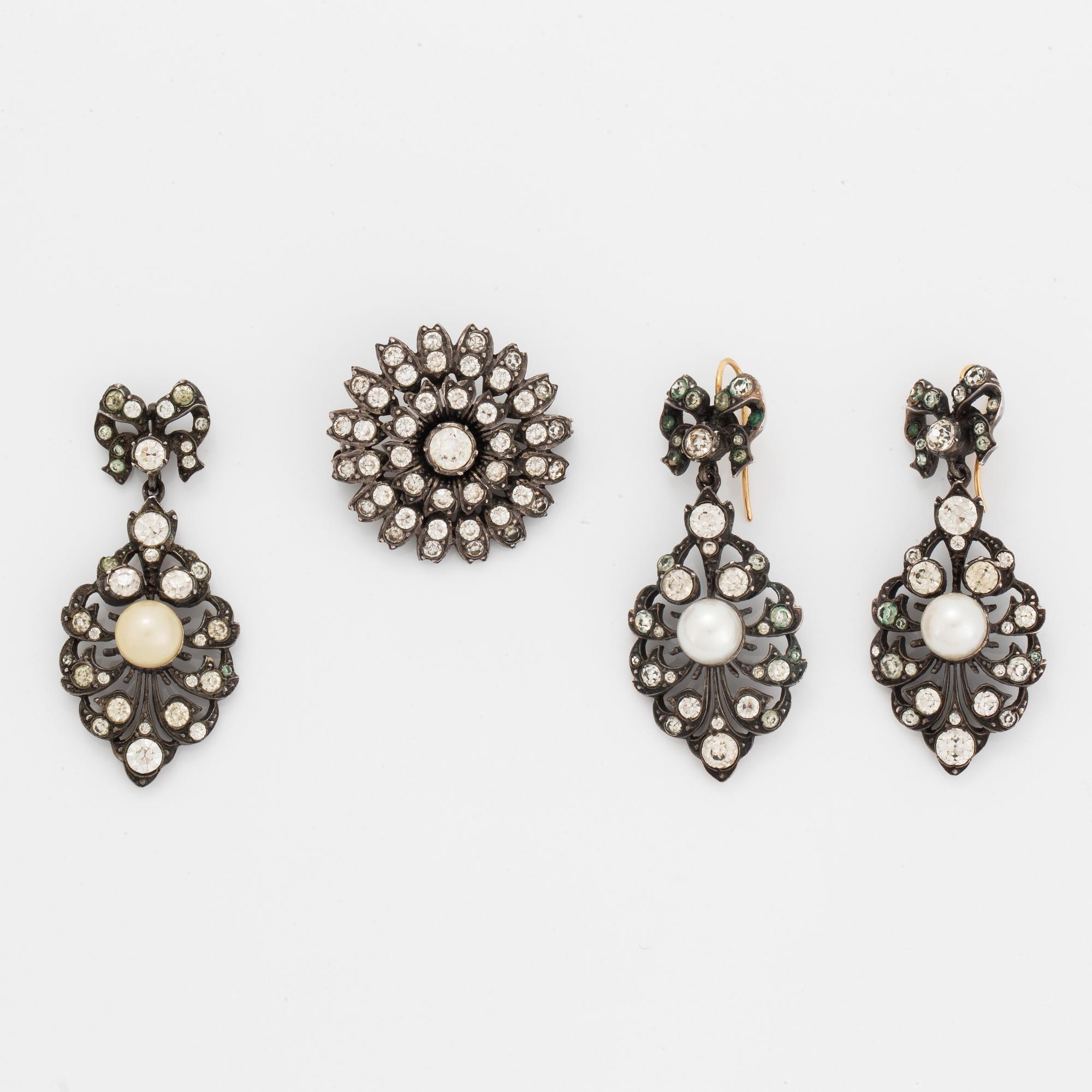 Earrings, brooch, and pendant silver with paste.