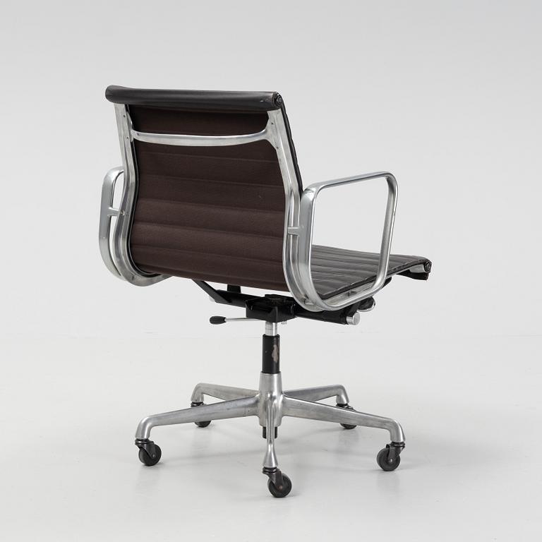 An EA 118 swivel office chair by  Charles and Ray Eames for Herman Miller, designed 1958.