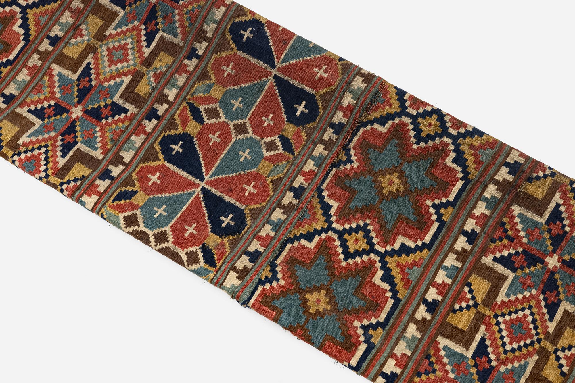 A flat weave 'Rosettes', Bench cushion c. 205 x 50 cm, Southwestern Scania, Sweden, first half of the 19th century.