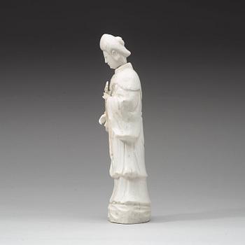 A blanc de chine figure of a court attendant, Qing dynasty, Kangxi ca 1690.