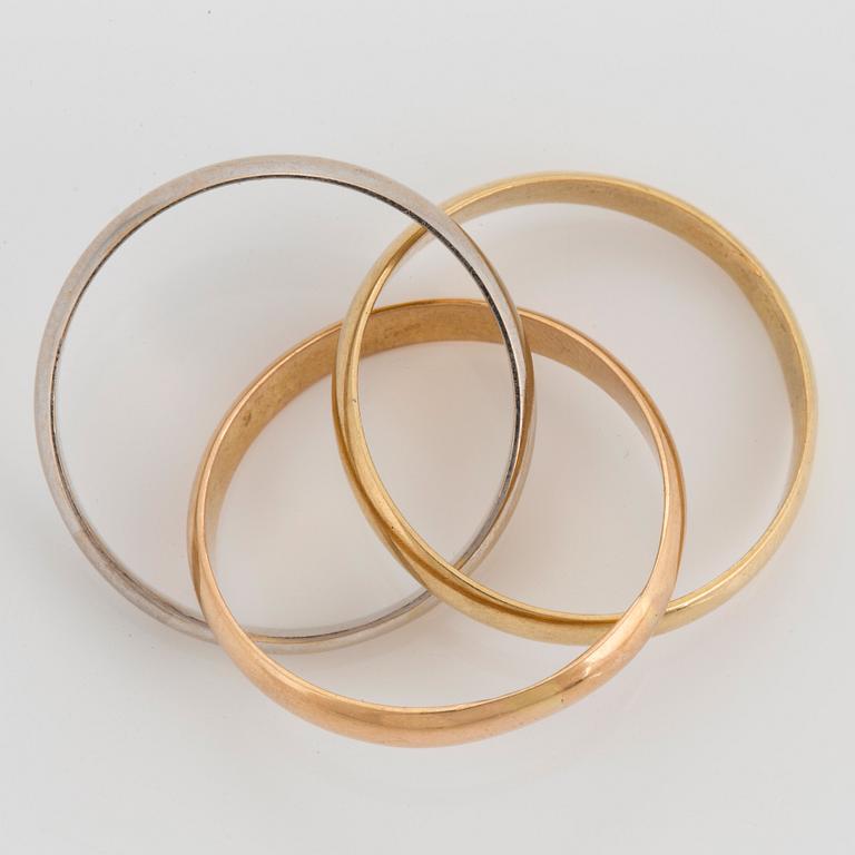 A Cartier "Trinity" ring.