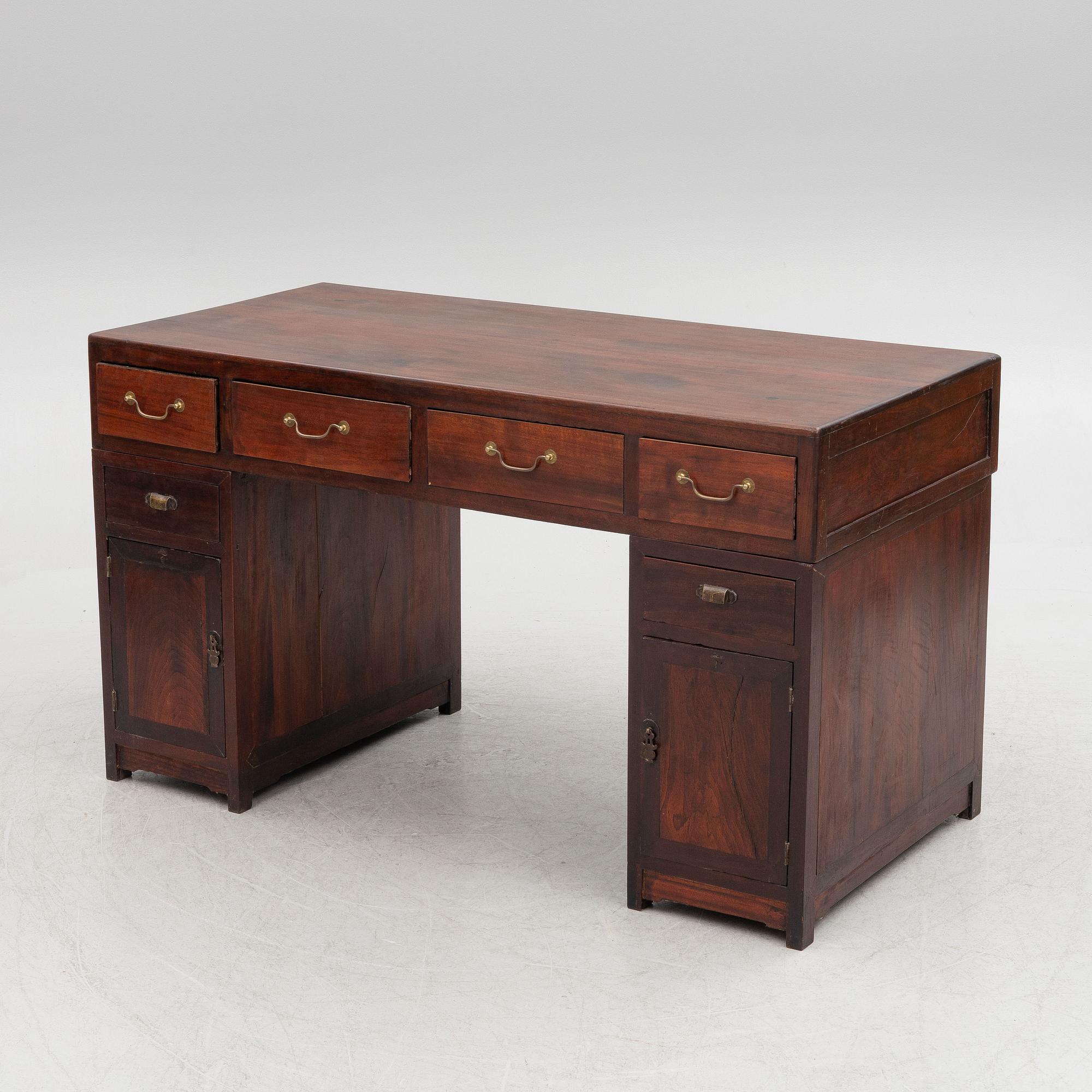 A Chinese hardwood desk, 20th century.
