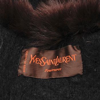 YVES SAINT LAURENT, a black wool and brown fur trimmed cape.