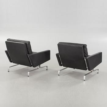 A pair of "PK31" chairs, designed by Poul Kjaerholm, one labeled Frtiz Hansen, 1983.