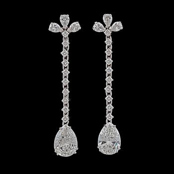 981. A pair of diamond, total carat weight circa 5.80 cts, earrings.