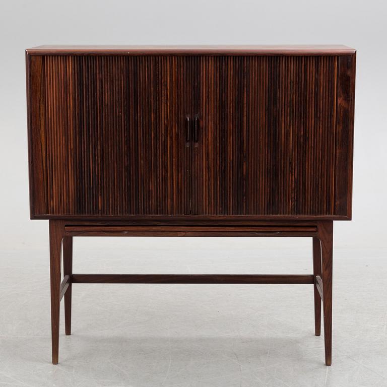 KURT ØSTERVIG, a Danish rosewood veneered drinks cabinet, 1960's.