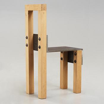 A Jonas Bohlin oak and iron chair 'Sto', executed in Stockholm in 1990,