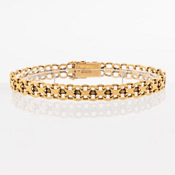 Armband. 18K guld, x-länk.