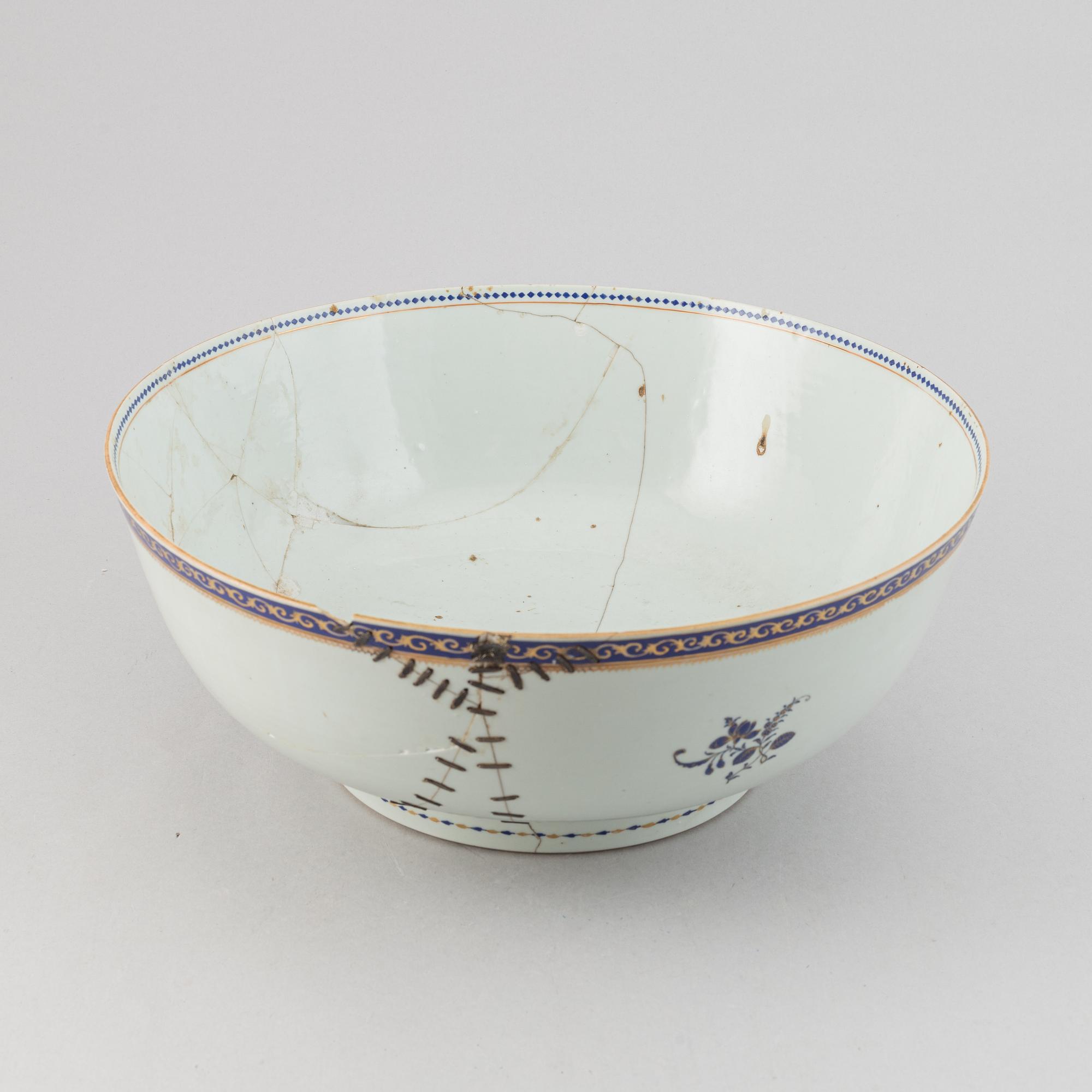 Two large famille rose and gilt punch bowls, Qing dynasty, 18th century.