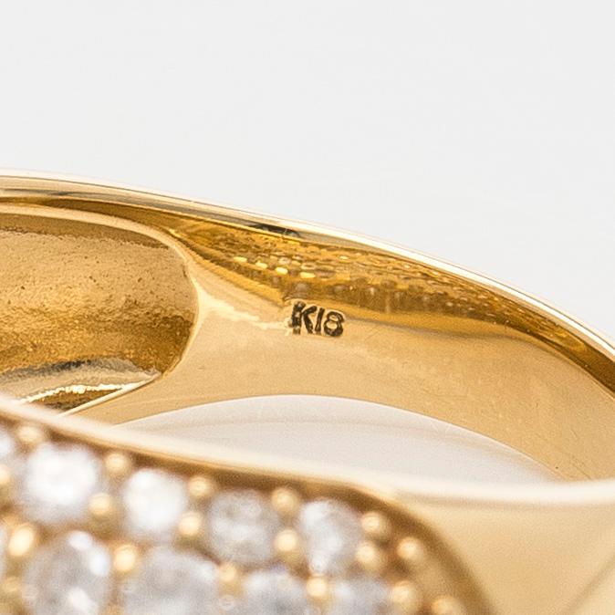 Sormus, 18K kultaa ja briljanttihiottuja timantteja.