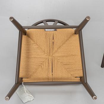 Hans J. Wegner, four CH 24 chairs, Carl Hansen & Son, Denmark.