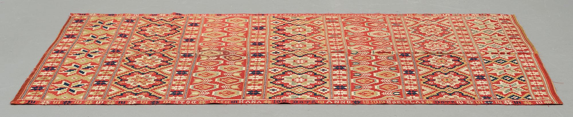 A BED COVER, double-interlocked tapestry, ca 197 x 117,5 cm, Scania (Skåne)1810, probably Gärds or Villands district.