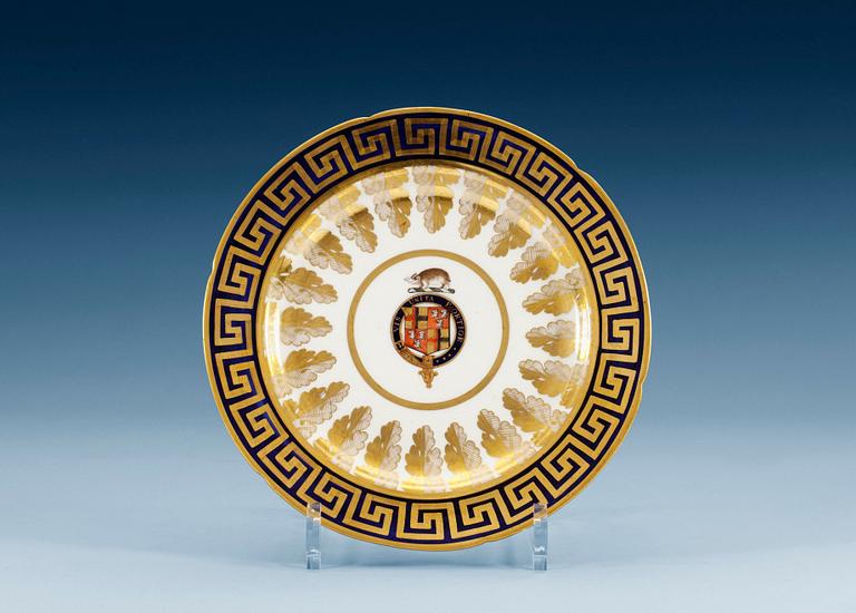 A set of six English armorial dinner plates, 19th Century. (6).