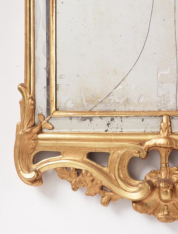 A Rococo giltwood mirror by N. Meunier (master in Stockholm 1754-97).