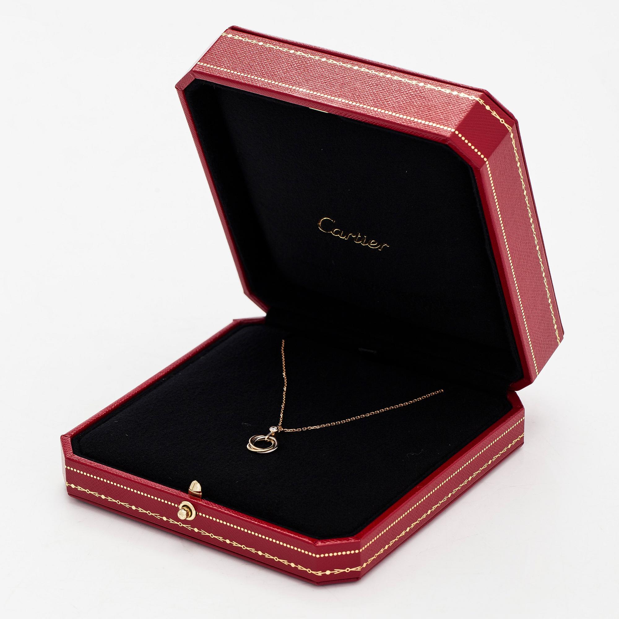 Cartier, halsband, "Trinity Pendant", 18K guld och en briljantslipad diamant.