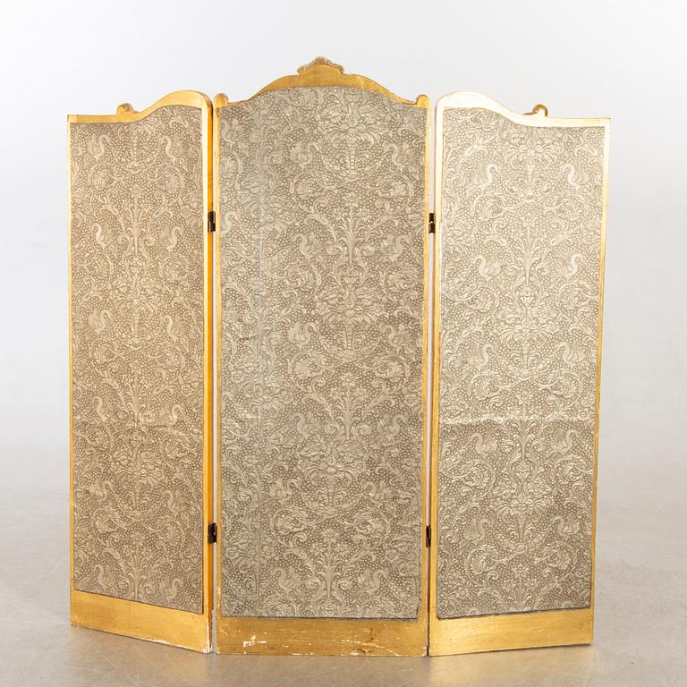 A Louis XVI-styel folding screen beginning of the 20th century.