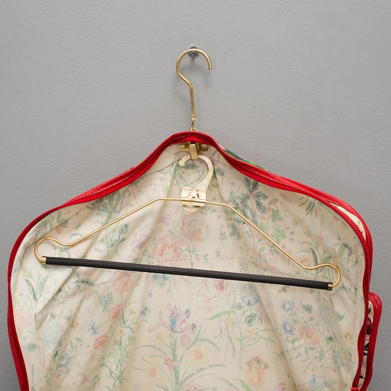 GUCCI, a 'Flora' garment bag.