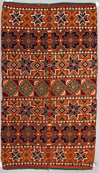 A BED COVER/A TEXTILE, double-interlocked tapestry, ca 221 x 124,5 cm, Scania the 19th century.