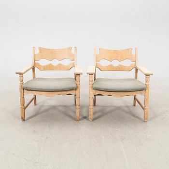 Henry (Henning) Kjaernulf, pair of arm chairs Nyrup furniture factory, Denmark, mid 20th century.