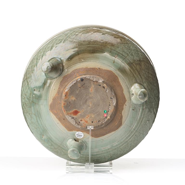 A celadon glazed tripod censer, Ming dynasty (1368-1644).