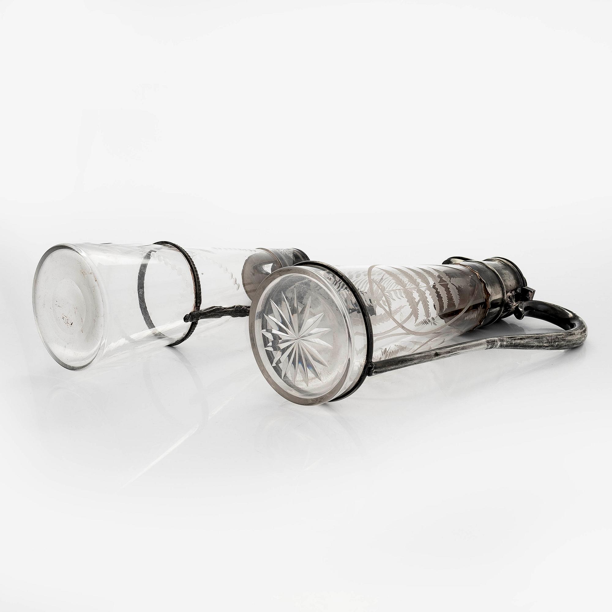 Two wine pitches, around 1900.