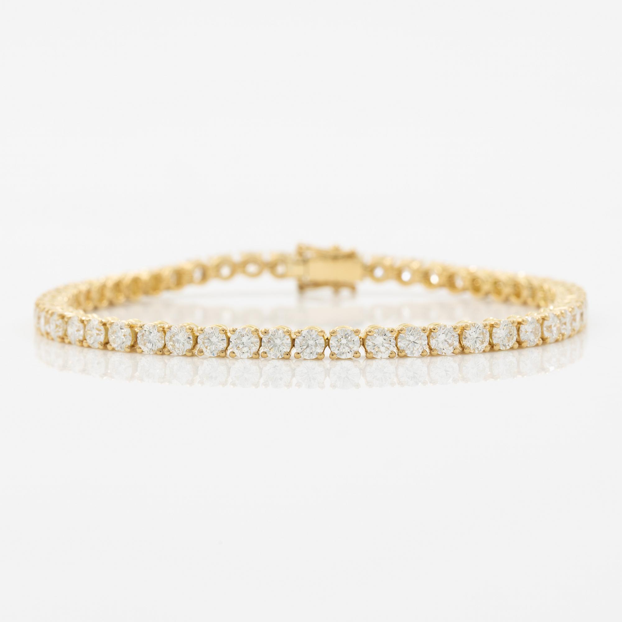 Tennis bracelet in 18K gold with round brilliant-cut diamonds.