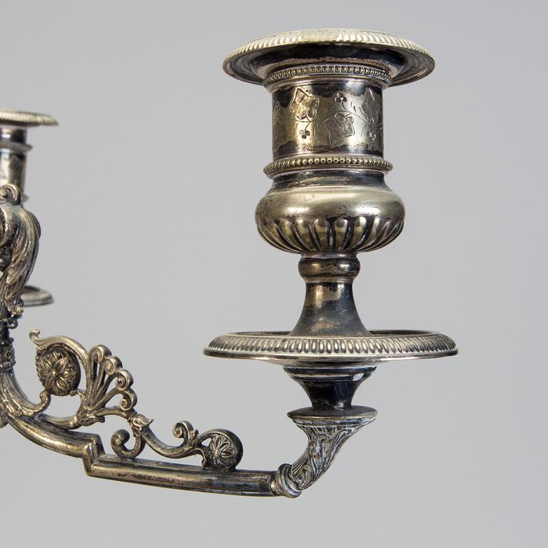 A pair of late 19th century silver plated kandelabras by Henry Wilkinson & Co Ltd, Sheffield, England.