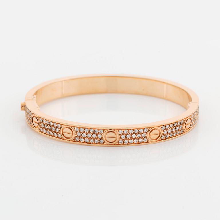 A Cartier bracelet "Love" in 18K rose gold set with round brilliant-cut diamonds.