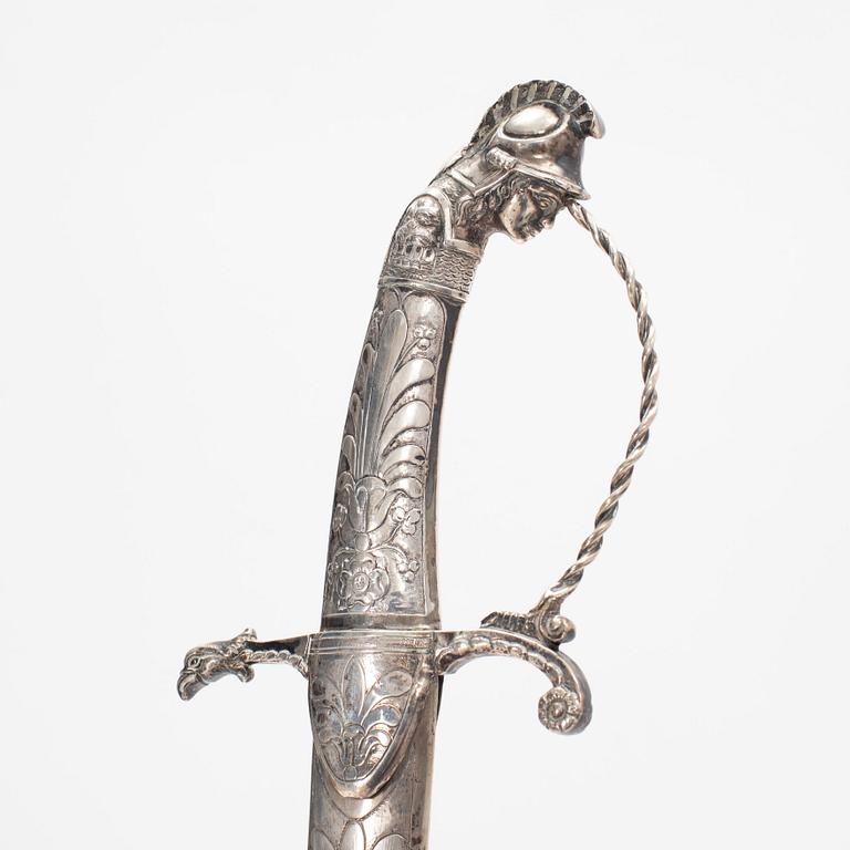 An Austro.Hungarian silver hilted sabre with silver scabbard, first part of the 19th Century.